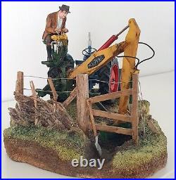 Border fine arts figurine A days work ditching farmer on digger Mint/boxed