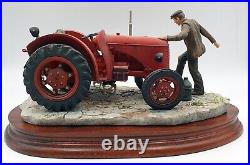 Border fine arts figurine Kick start Farmer & tractor with dog Mint/boxed